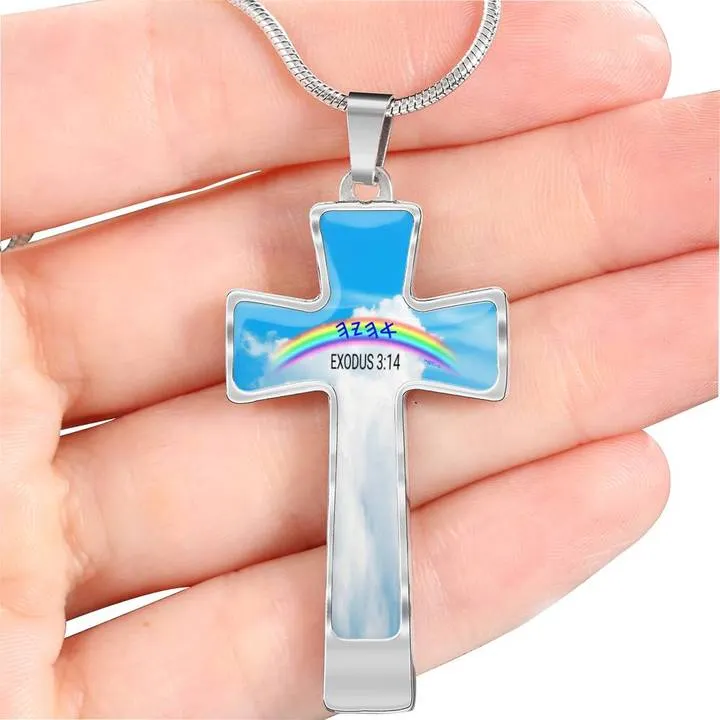 A person holding a symbolic cross featuring a vibrant rainbow. of Ahayah the creator